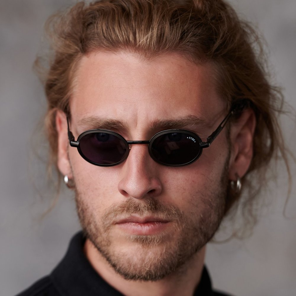 Round vintage sunglasses by Sting, Italy
